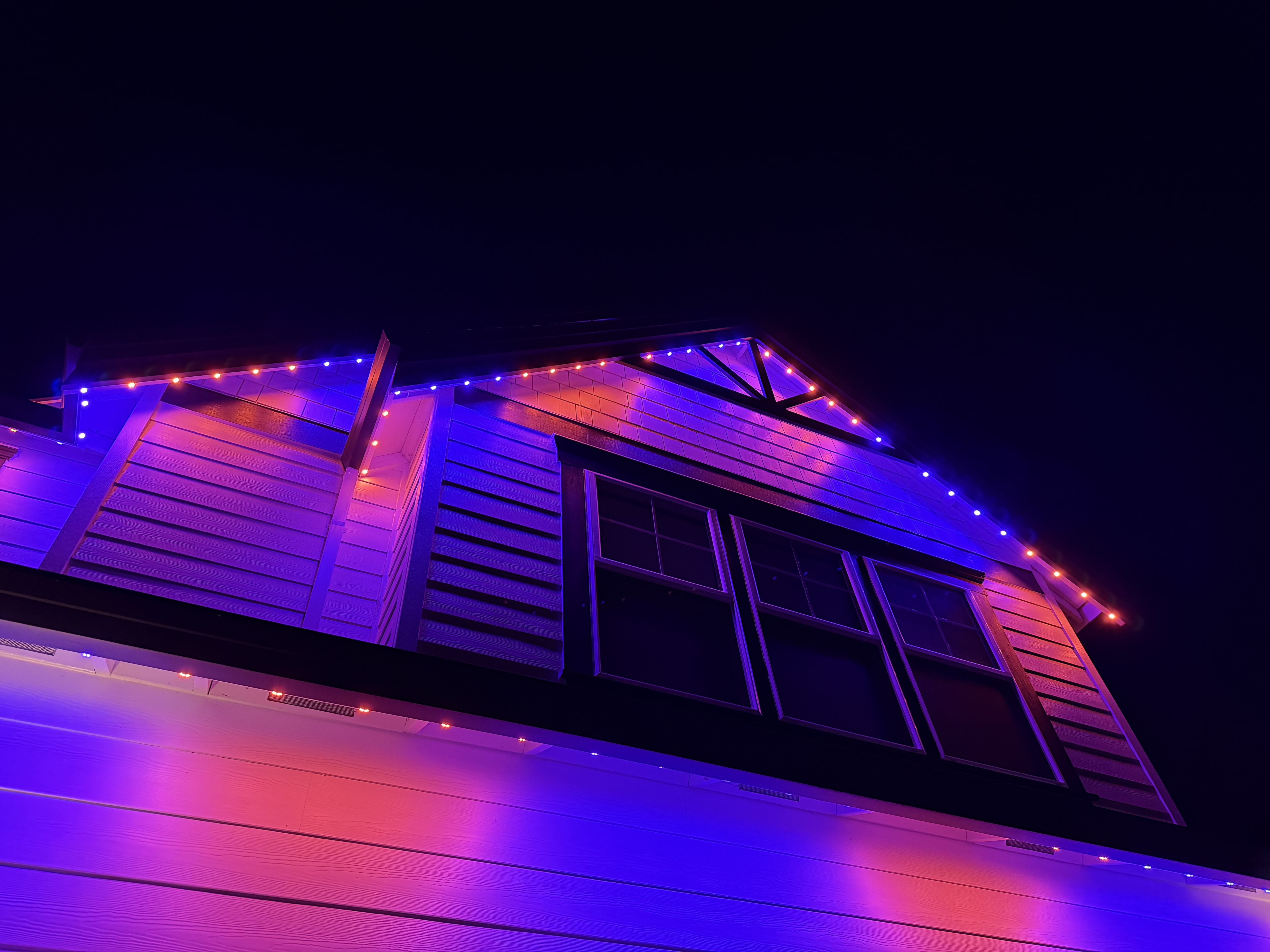 Roofline lighting detail at night